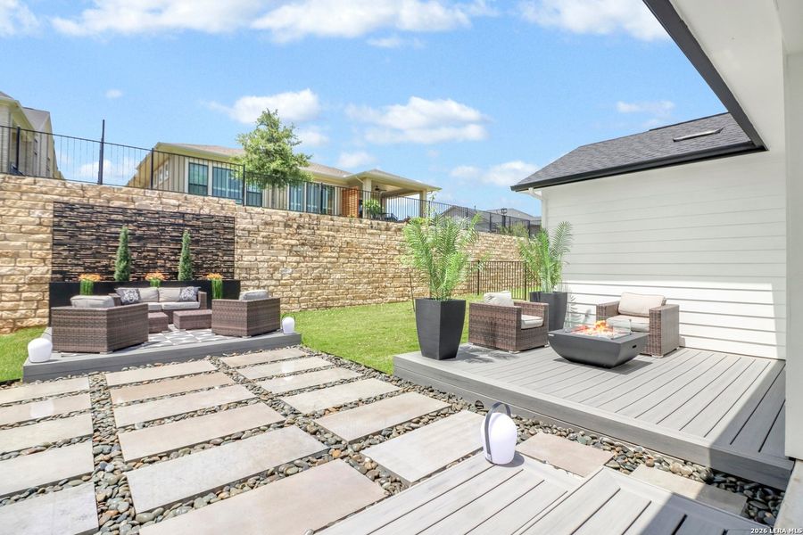 Exterior details and patio area of a home in Kissing Tree, San Marcos (Image 24).