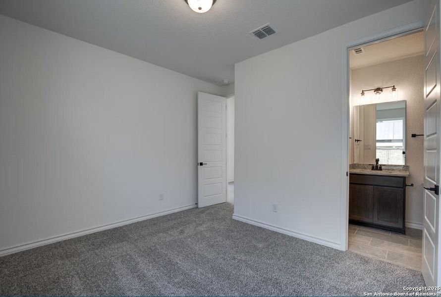 Spacious, unfurnished interior of a new home in The Reserve at Potranco Oaks, Castroville (Image 19).