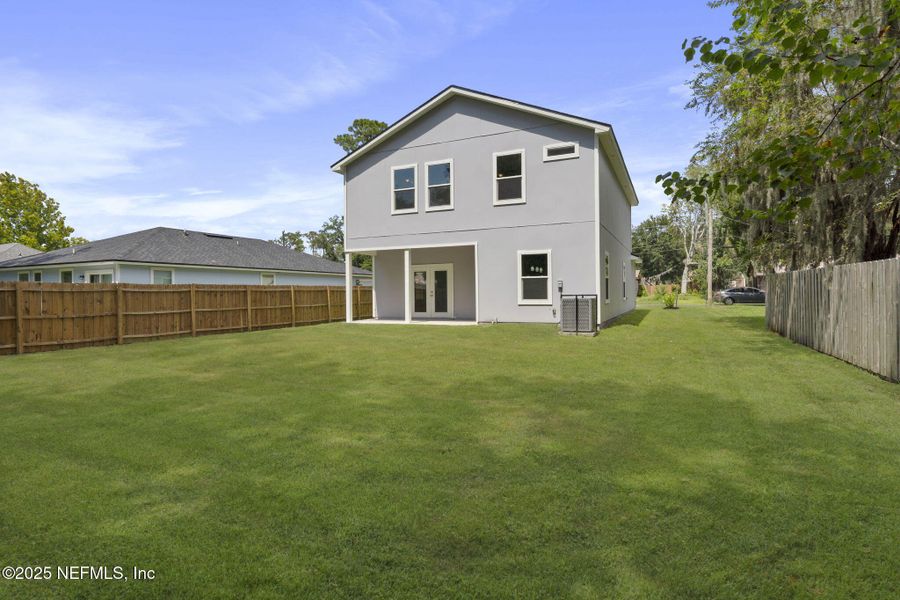 Front exterior of a new home in , Fleming Island, FL, highlighting curb appeal (Image 16).