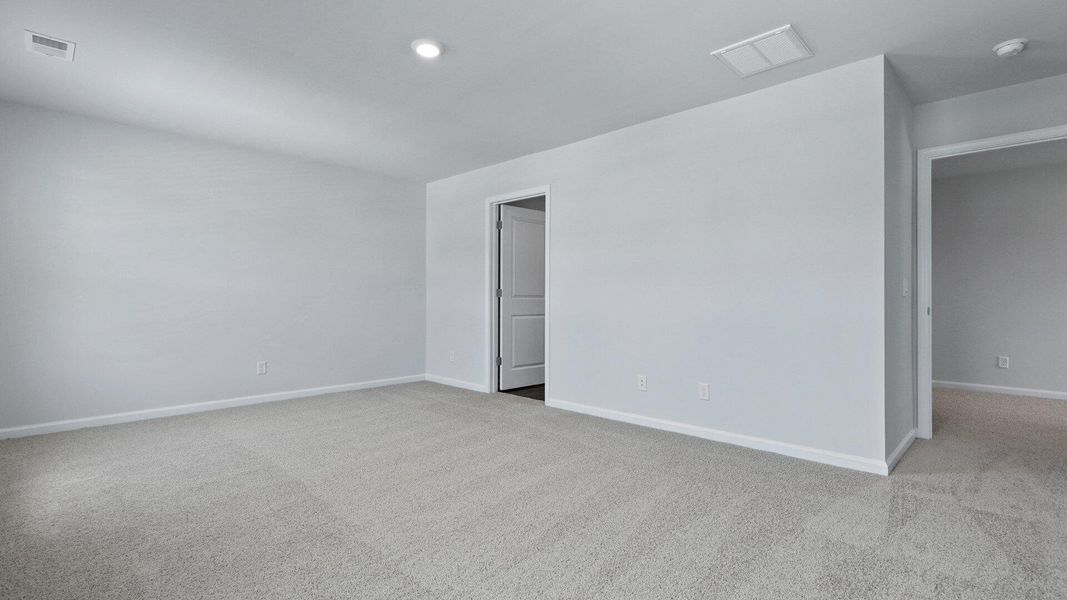 Spacious, unfurnished interior of a new home in Pine Hills at Cane Bay, Summerville (Image 15). Spacious, unfurnished interior of a new home in Pine Hills at Cane Bay, Summerville (Image 15).