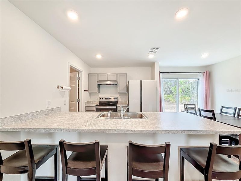 Furnished interior view inside a new home in , Port Charlotte (Image 6).