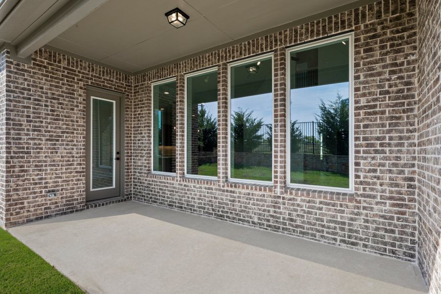 Exterior details and patio area of a home in Nelson Lake Estates, Rockwall (Image 2).