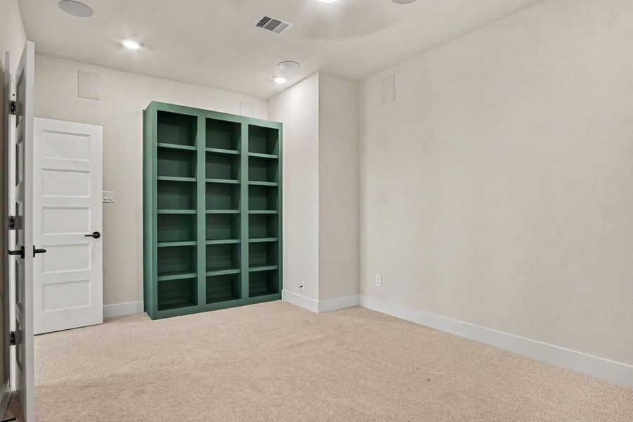 Additional view of media room with custom built-in cabinets. Additional view of media room with custom built-in cabinets.