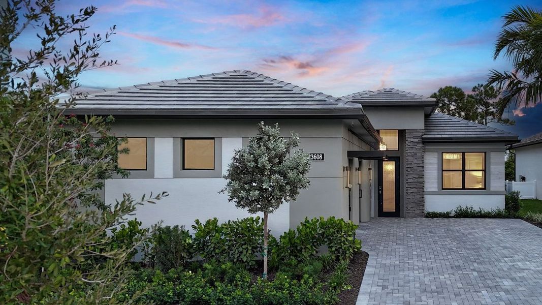 Representative exterior photo of a completed home built from the Lila by Kolter Homes in L'Ambiance at Avenir, Palm Beach Gardens, FL (Image 2).