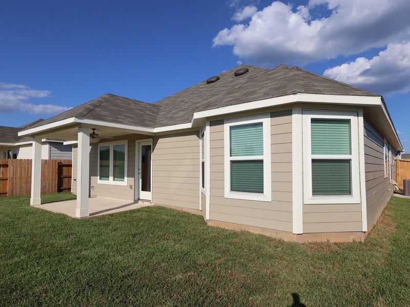 Exterior details and patio area of a home in Moran Ranch, Willis (Image 2). Exterior details and patio area of a home in Moran Ranch, Willis (Image 2).