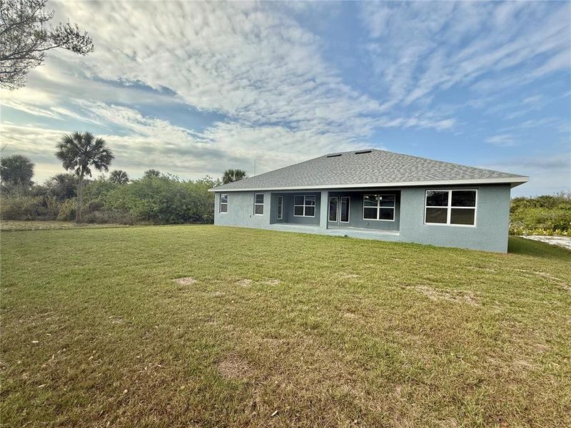 Exterior details and patio area of a home in , Port Charlotte (Image 21).