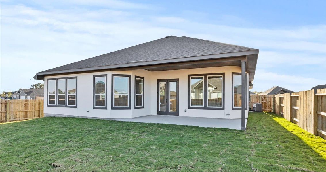 Exterior details and patio area of a home in Village at Three Oaks, Seguin (Image 4). Exterior details and patio area of a home in Village at Three Oaks, Seguin (Image 4).