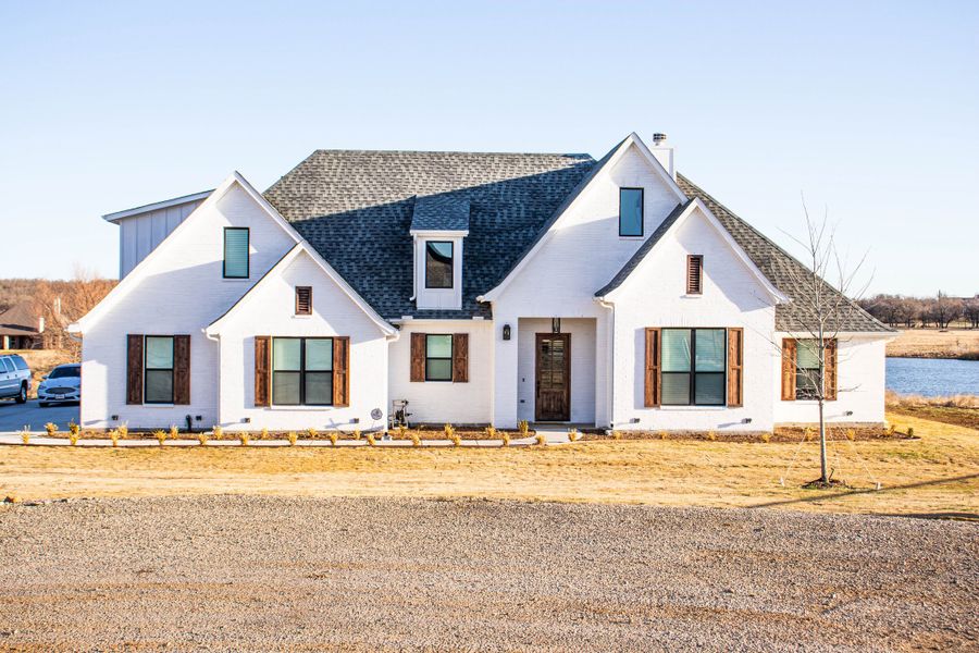 Representative exterior photo of a completed home built from the Refuge Lane by Trinity Classic Homes in Zion Trails, Poolville, TX (Image 26).