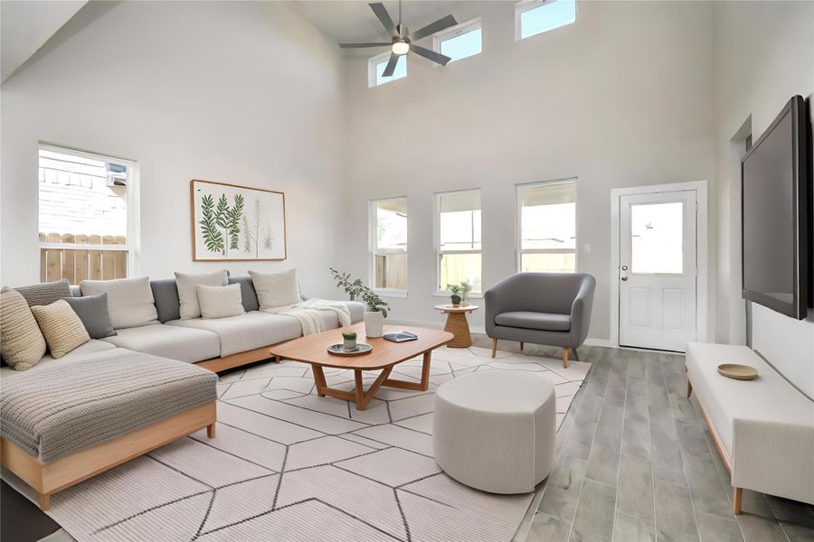 *Virtually Staged* Family Room. Sample photo of completed home with similar floor plan. Actual colors and selections may vary.