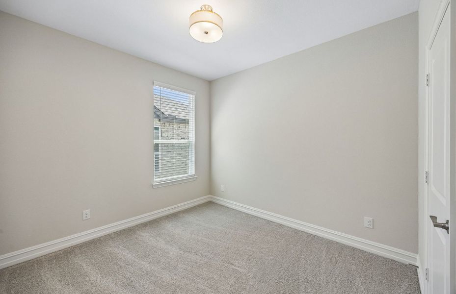 Spacious, unfurnished interior of a new home in Rosemary Fields, Godley (Image 16).
