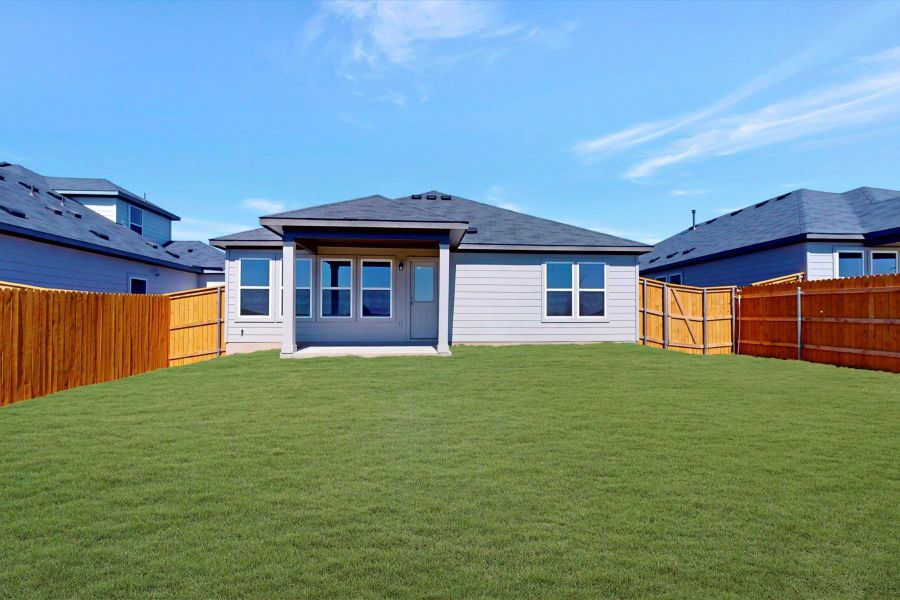 Exterior details and patio area of a home in Carillon, Manor (Image 3).