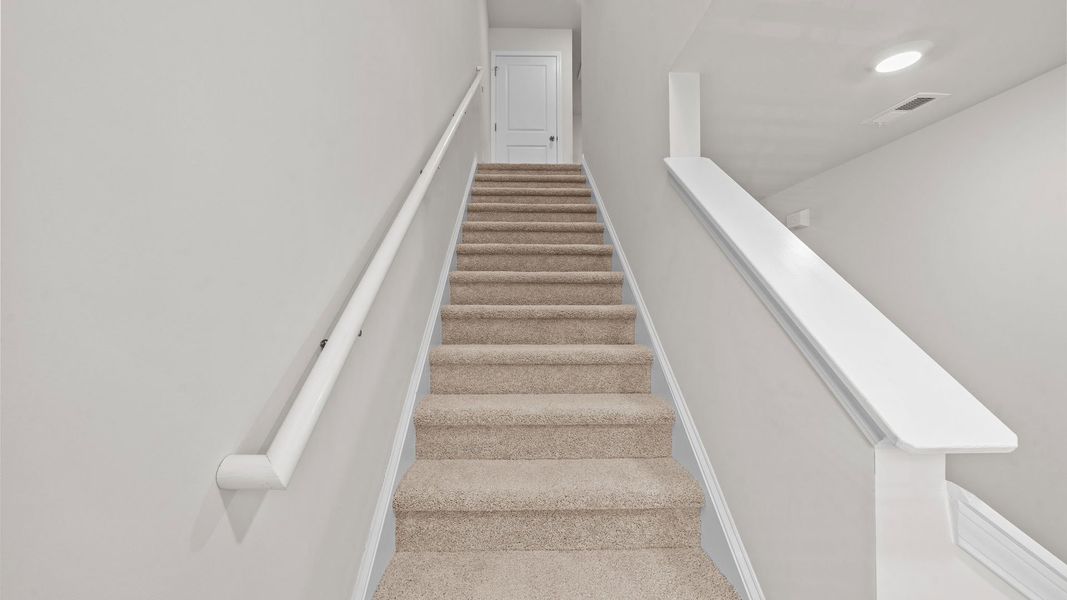 Representative unfurnished interior of a home built from the Pearson by D.R. Horton in The Townes at Carter Ridge, Greenville (Image 10).