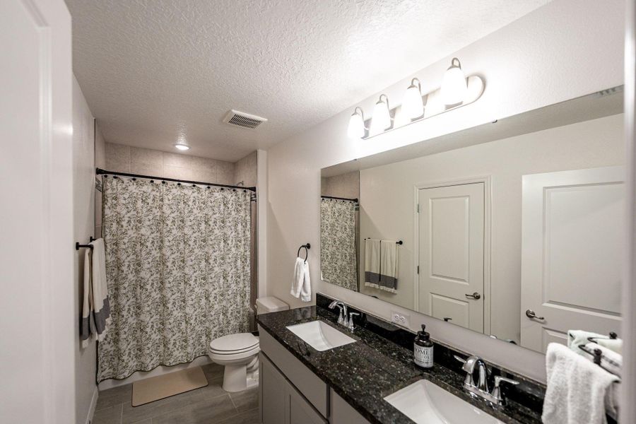 Furnished interior view inside a new home in , Port St. Lucie (Image 9).