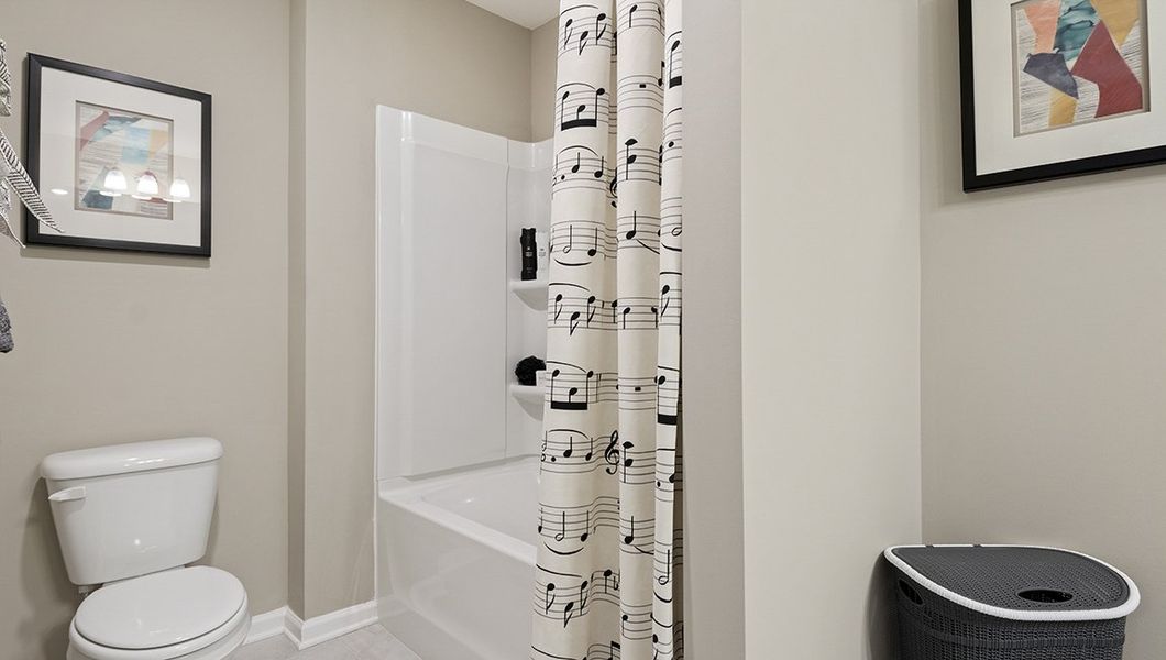 Representative furnished interior of a home built from the Windsor by D.R. Horton in Harrison Valley, Simpsonville (Image 29).