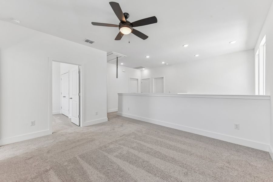 Spacious, unfurnished interior of a new home in Freedom at Anthem, Kyle (Image 15).