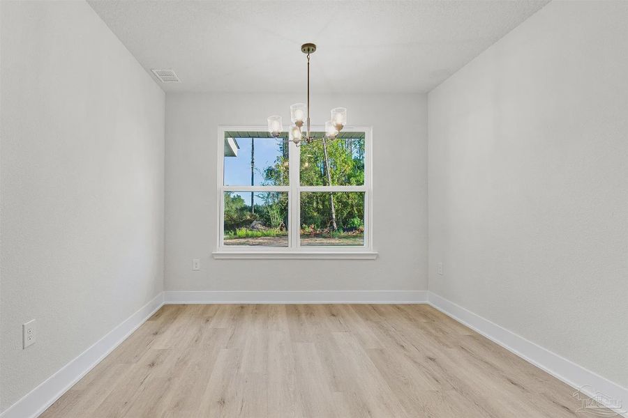 Spacious, unfurnished interior of a new home in Pecan Valley, Cantonment (Image 8). Spacious, unfurnished interior of a new home in Pecan Valley, Cantonment (Image 8).