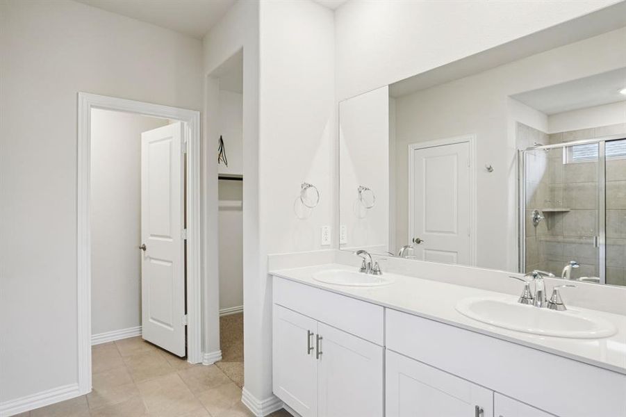 Furnished interior view inside a new home in Parks at Foster Crossing - Premier Series, Anna (Image 16). Furnished interior view inside a new home in Parks at Foster Crossing - Premier Series, Anna (Image 16).