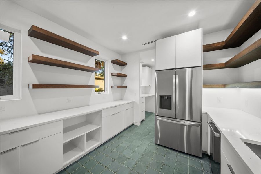 Pantry featuring open shelves, cabinetry, appliances with 2nd sink, 2nd refrigerator and a 2nd dishwasher