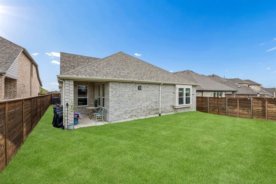 Exterior details and patio area of a home in Solterra Texas, Mesquite (Image 3).