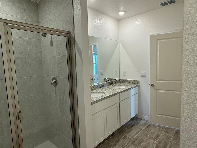 Furnished interior view inside a new home in Heritage Station, Punta Gorda (Image 9).