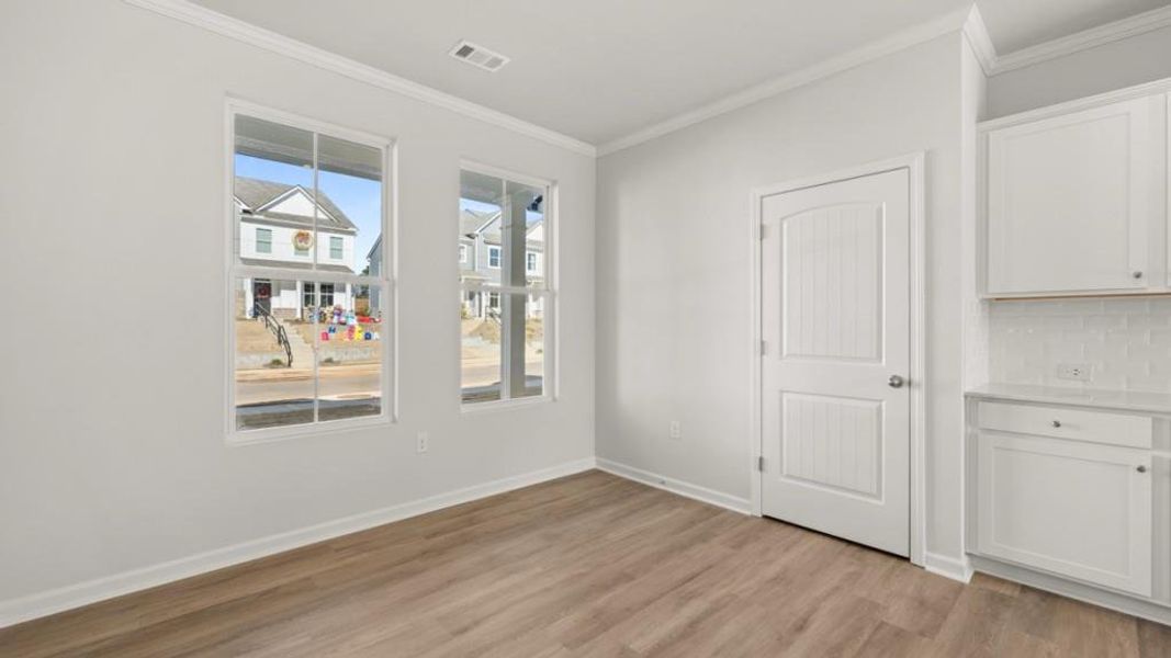 Spacious, unfurnished interior of a new home in Waypoint, Flowery Branch (Image 19).