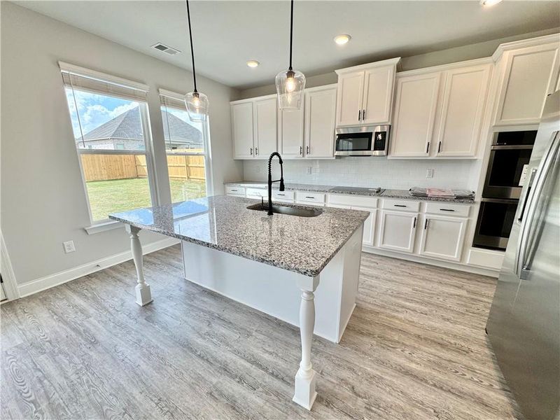 Furnished interior view inside a new home in , Gray (Image 9).