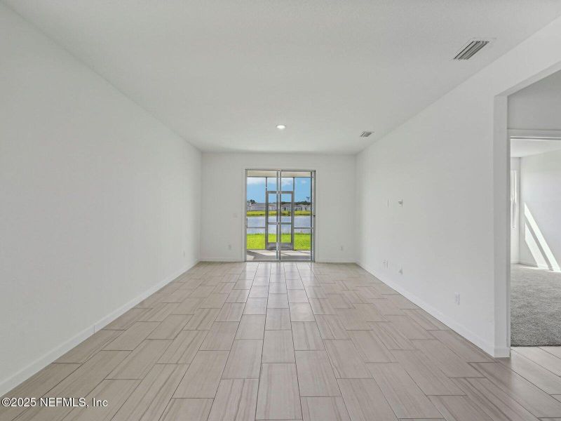 Spacious, unfurnished interior of a new home in Lakes at Bella Lago - Signature Series, Green Cove Springs (Image 28).