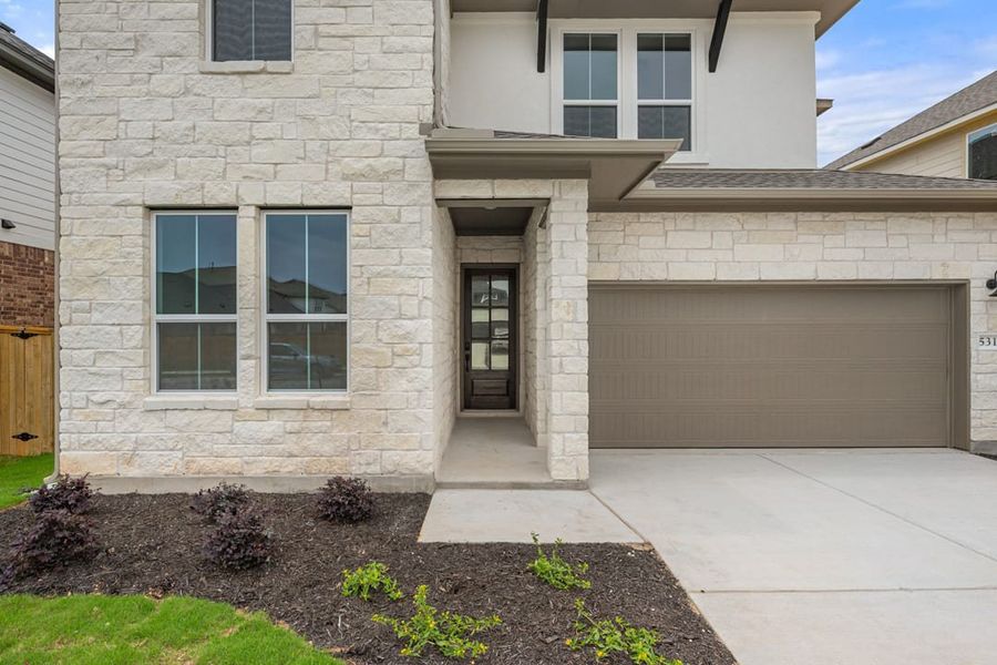 Exterior details and patio area of a home in Heritage, Dripping Springs (Image 3).