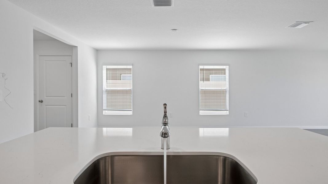 Representative interior finishes for a home built from the Robie Modern by D.R. Horton in Berry Bay, Wimauma (Image 11).