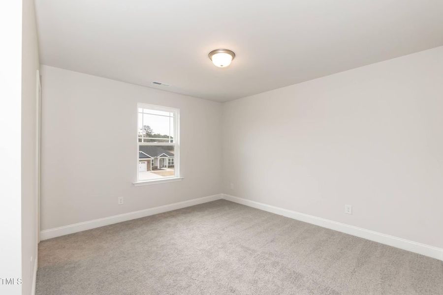 Representative unfurnished interior of a home built from the 2913 by Adams Homes in Hidden Pines, Cameron (Image 31).