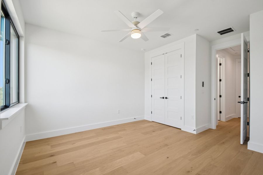 Spacious, unfurnished interior of a new home in Milky Way at River Place, Austin (Image 34).