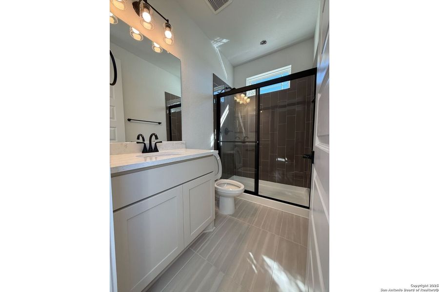Furnished interior view inside a new home in Caliza Reserve, Boerne (Image 10).