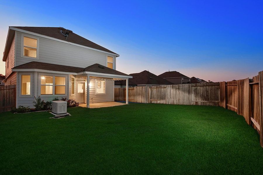 Exterior details and patio area of a home in River's Edge, Conroe (Image 20). Exterior details and patio area of a home in River's Edge, Conroe (Image 20).
