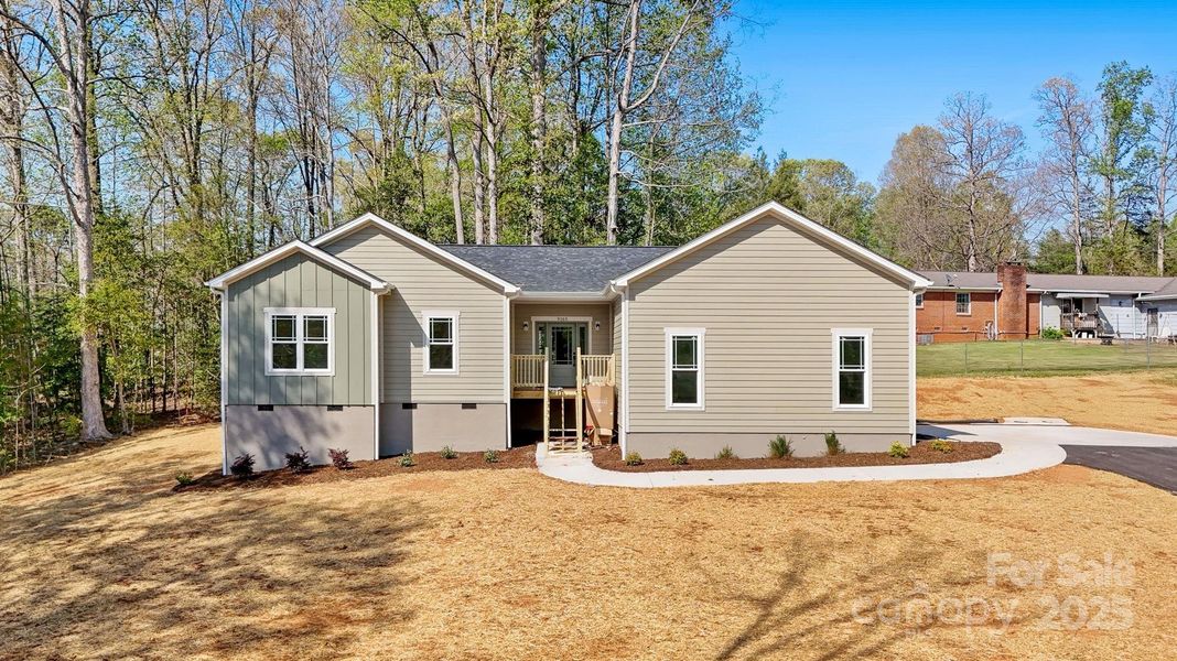 Front exterior of a new home in , Hickory, NC, highlighting curb appeal (Image 2).