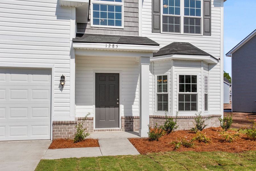 Representative exterior photo of a completed home built from the The Sunbury by RTS Homes in Doctor's Creek, Ludowici, GA (Image 20).