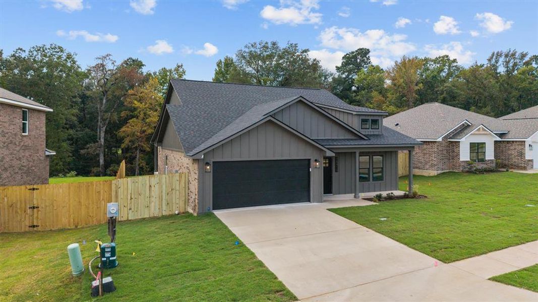 Front exterior of a new home in , Lindale, TX, highlighting curb appeal (Image 18). Front exterior of a new home in , Lindale, TX, highlighting curb appeal (Image 18).