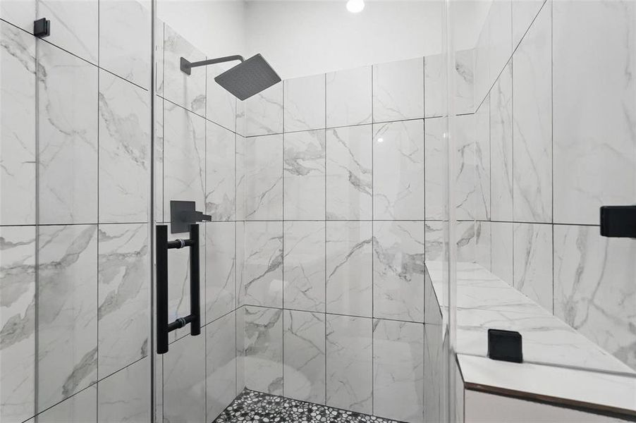 Bathroom with a marble finish shower Bathroom with a marble finish shower