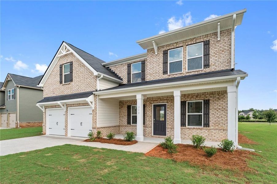Front exterior of a new home in Southern Hills, McDonough, GA, highlighting curb appeal (Image 2). Front exterior of a new home in Southern Hills, McDonough, GA, highlighting curb appeal (Image 2).