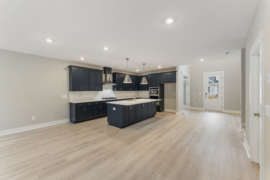 Representative furnished interior of a home built from the Riggs by Hunter Quinn Homes in Landing at Clemson Marina, Seneca (Image 7).