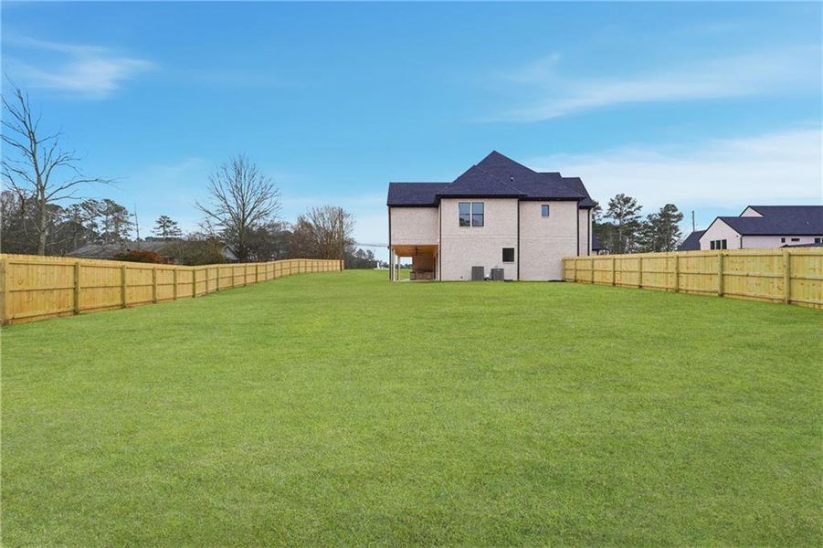 Exterior details and patio area of a home in , Buford (Image 26). Exterior details and patio area of a home in , Buford (Image 26).