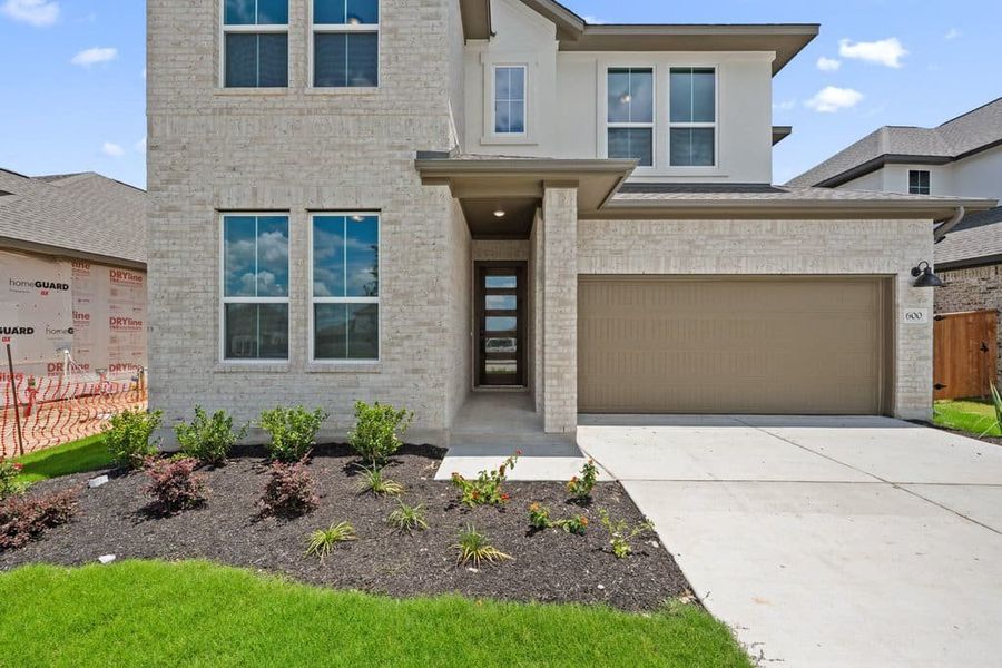 Exterior details and patio area of a home in Lariat, Liberty Hill (Image 3). Exterior details and patio area of a home in Lariat, Liberty Hill (Image 3).