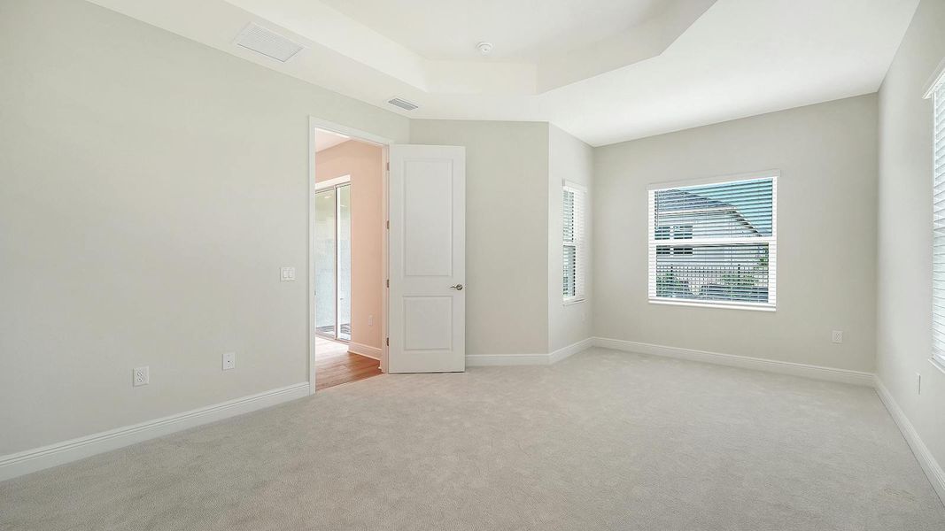 Spacious, unfurnished interior of a new home in Wildleaf Real Estate and Homes for Sale in Parrish, FL - Neal Communities, Parrish (Image 23).