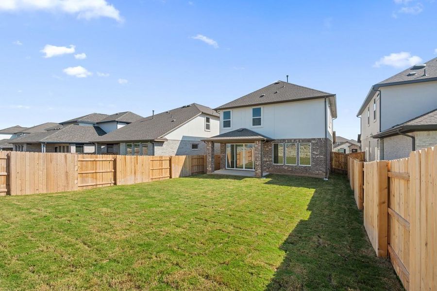 Exterior details and patio area of a home in Flora, Hutto (Image 19).