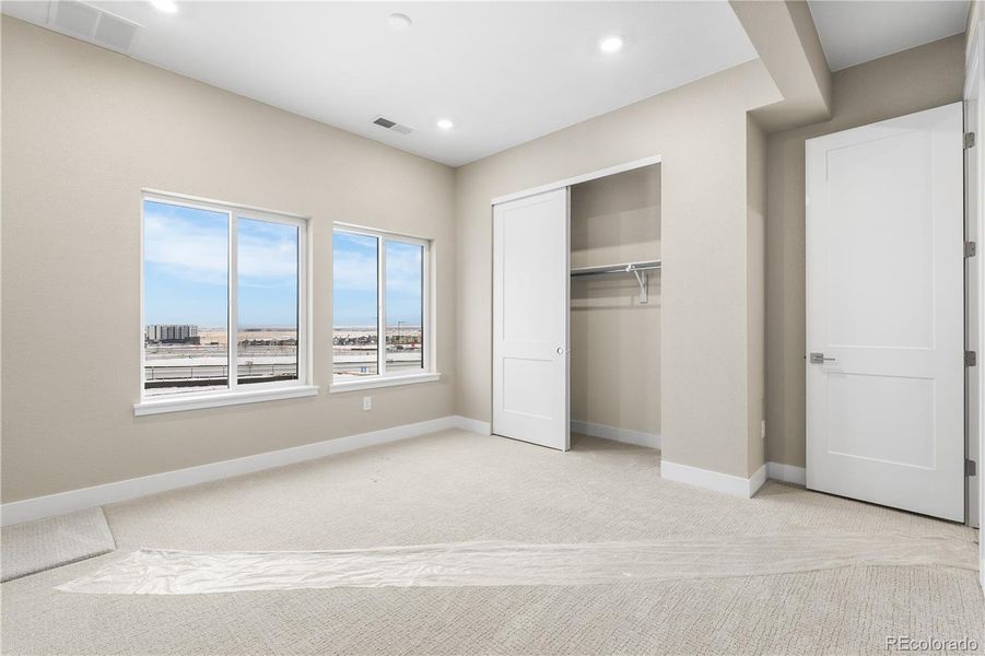 Spacious, unfurnished interior of a new home in Autograph at Lyric, Lone Tree (Image 40).