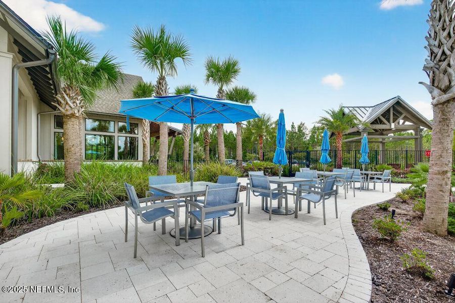 Front exterior of a new home in Tributary, Yulee, FL, highlighting curb appeal (Image 22).
