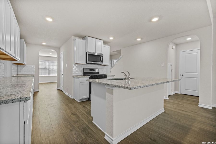 Furnished interior view inside a new home in Redbird Ranch, San Antonio (Image 11).