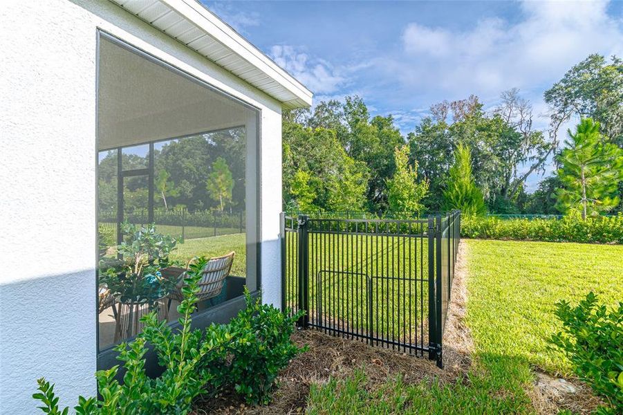 Front exterior of a new home in Ocala Preserve, Ocala, FL, highlighting curb appeal (Image 19).