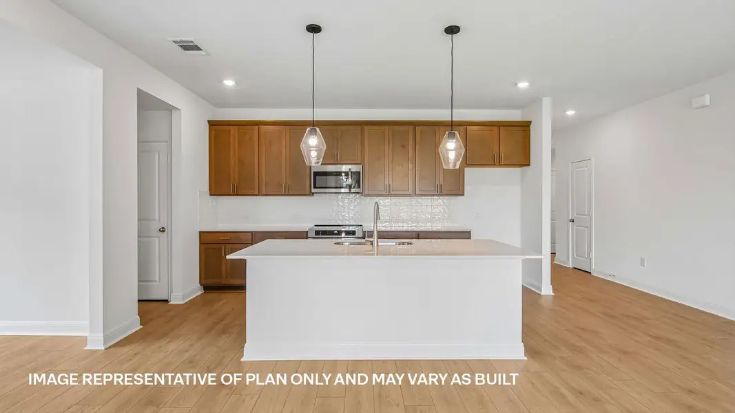 Furnished interior view inside a new home in Monarch Ranch, Manor (Image 5).