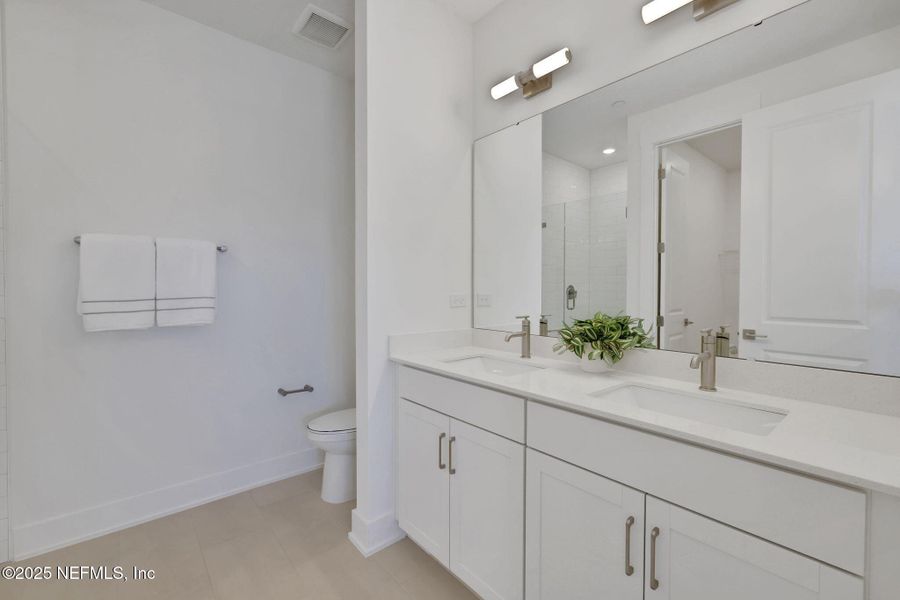 Furnished interior view inside a new home in North Beach Townhomes, Jacksonville Beach (Image 15).