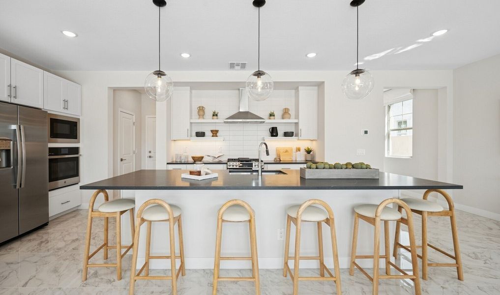 Kitchen with pendant lighting and spacious island
